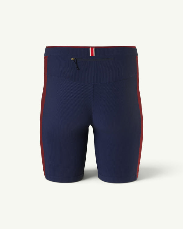 Amateur Men's Twilight half tights in navy blue with maroon side panels, back zipper pocket, and striped detail.