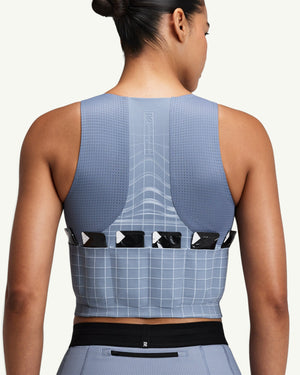 Amateur women's blue Vanisher race crop with back GeoMesh panels and multiple gel storage pockets