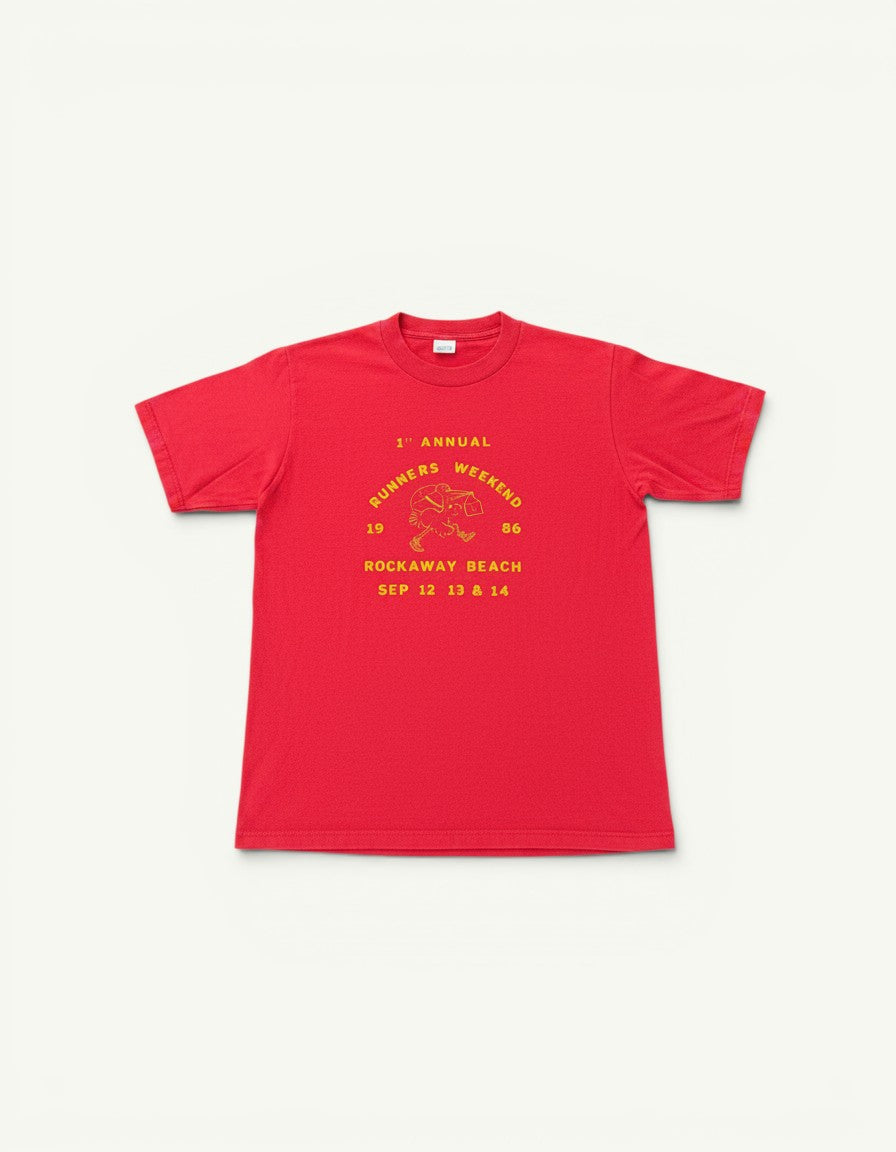 Amateur vintage red cotton T-shirt featuring yellow 1986 Rockaway Beach Runner's Weekend graphic print