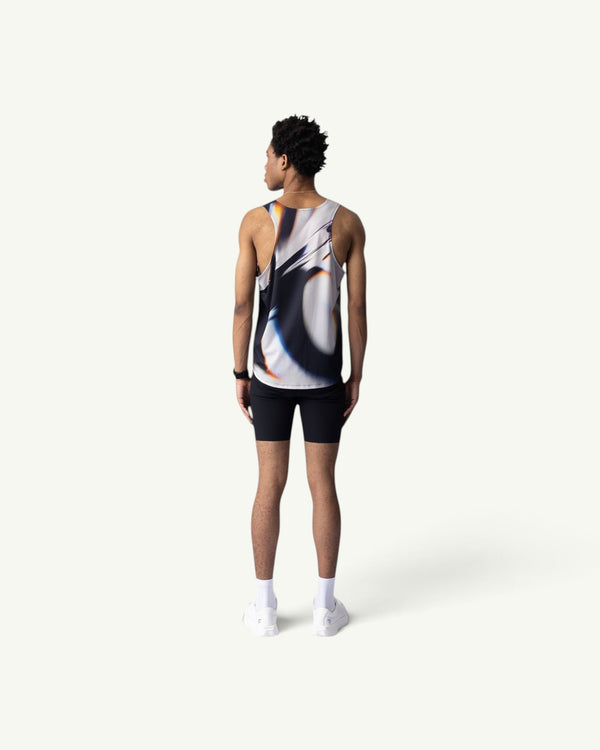 Amateur White Glass singlet with blurred abstract print on a male runner, back view showing lightweight performance fit