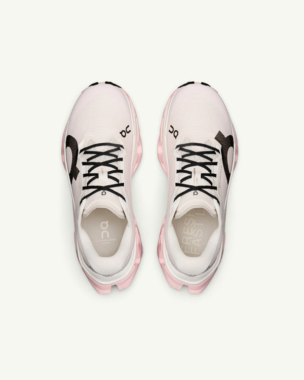 Amateur Women's Cloudmonster 3 Hyper running shoes in light pink with black accents and bouncy CloudTec sole