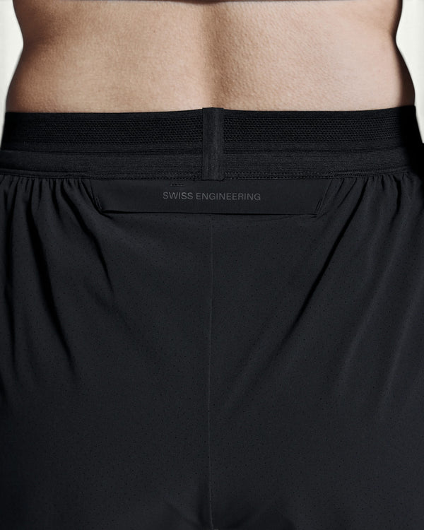Amateur women's black 2-in-1 performance running shorts with a supportive waistband and Swiss Engineering detail.
