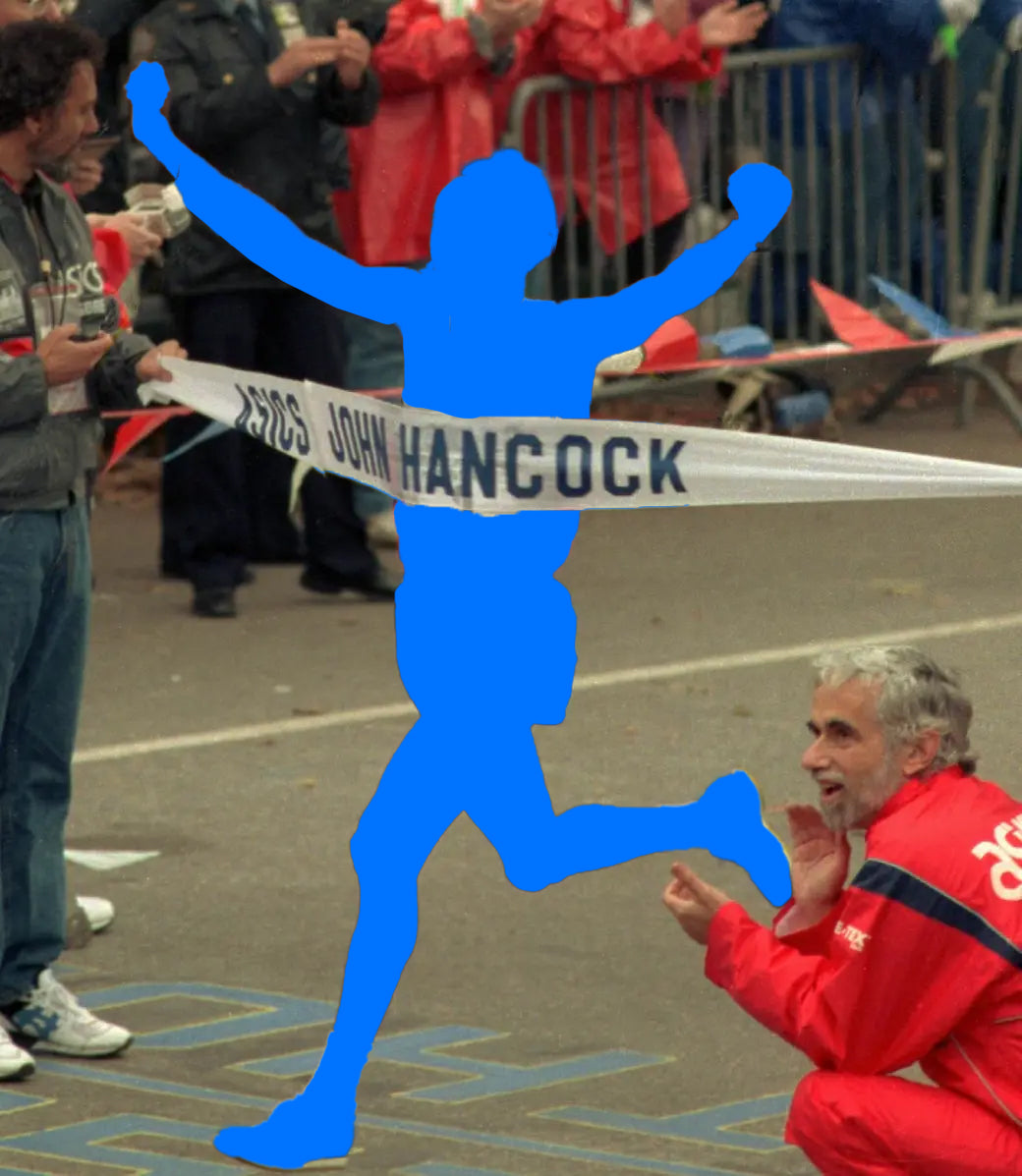 Archive photo: a winner, shown as a blue silhouette, breaks the finish tape while Fred Lebow crouches and claps in a red tracksuit